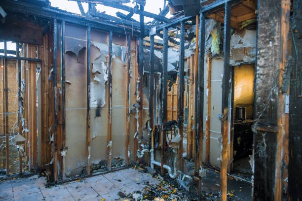 Professional Fire Damage Restoration technician working in Jewett City, CT